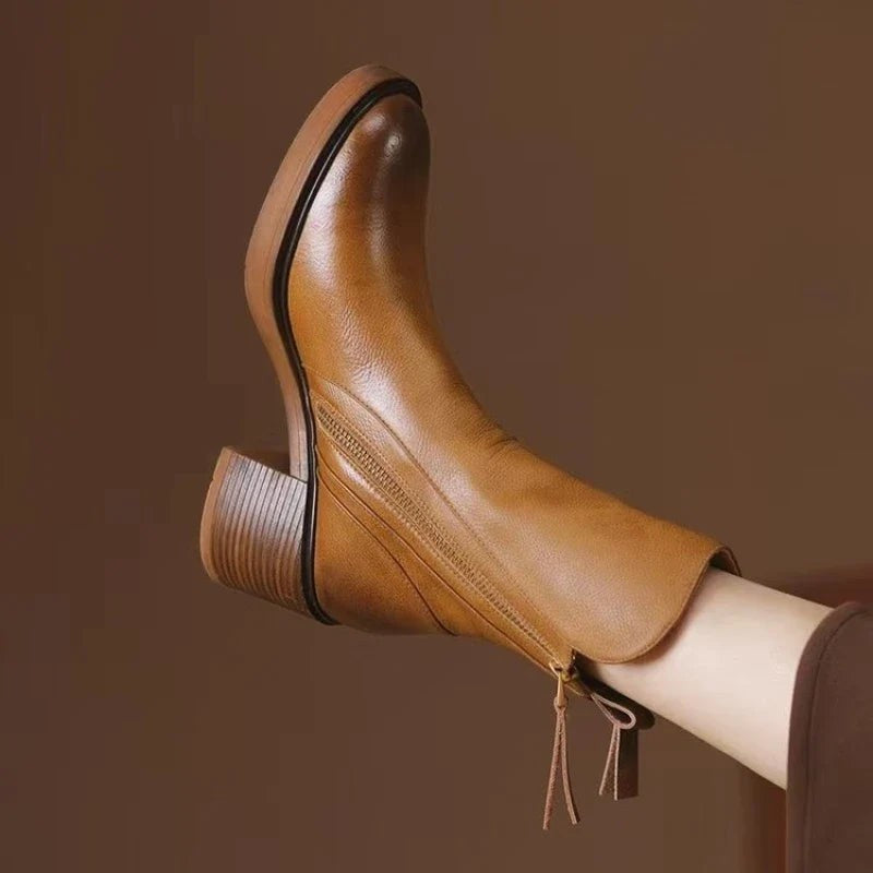 Bottines femme finition cuir à talons hauts avec fermeture éclair