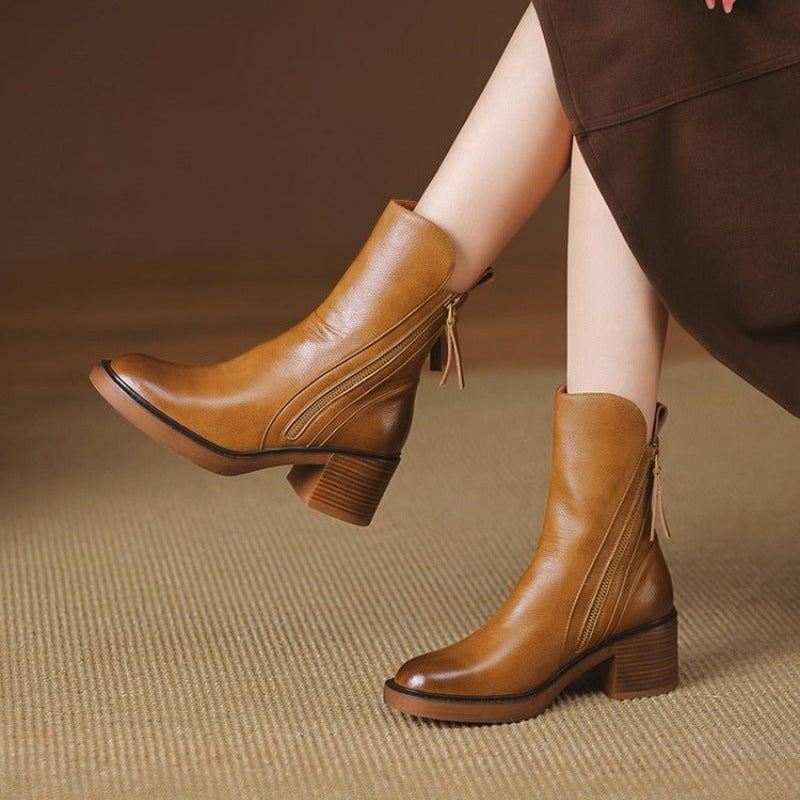 Bottines femme finition cuir à talons hauts avec fermeture éclair