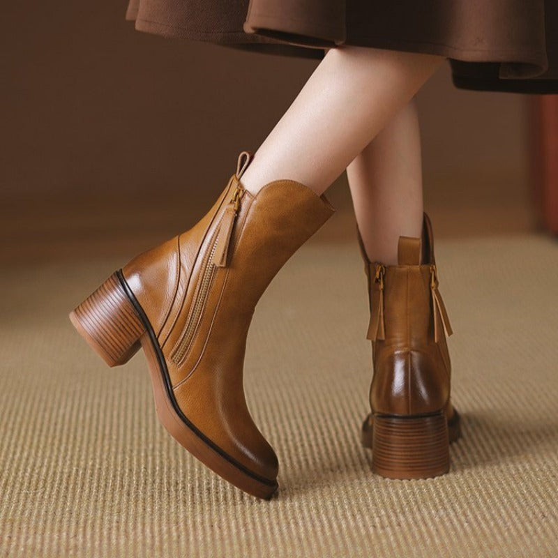 Bottines femme finition cuir à talons hauts avec fermeture éclair