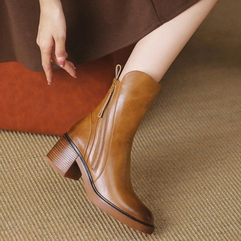 Bottines femme finition cuir à talons hauts avec fermeture éclair