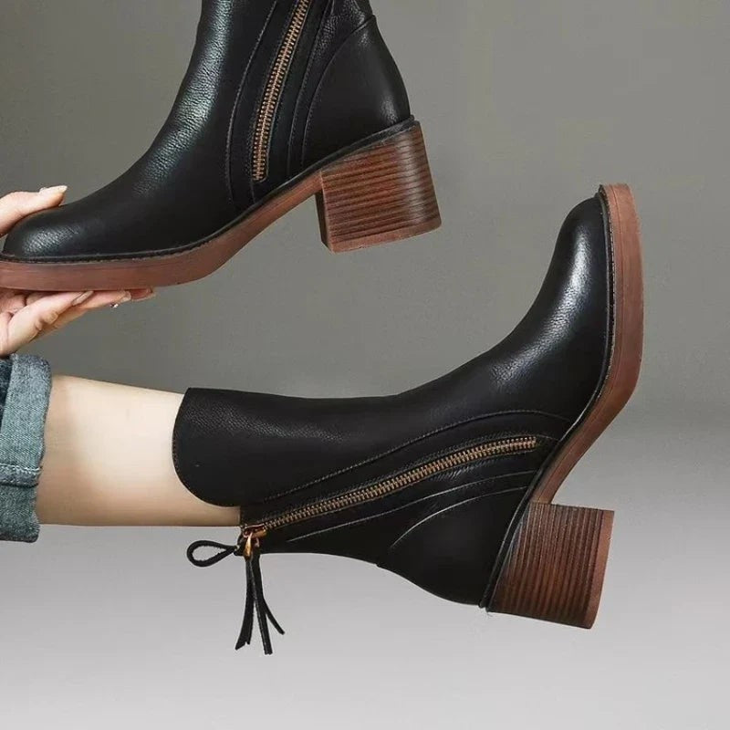 Bottines femme finition cuir à talons hauts avec fermeture éclair