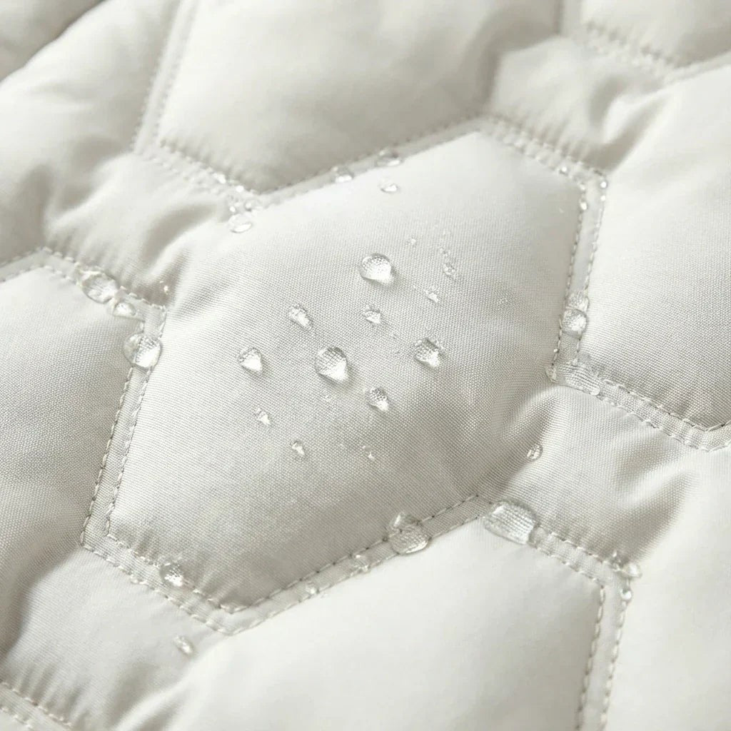 Doudoune longue matelassée à capuche pour femme