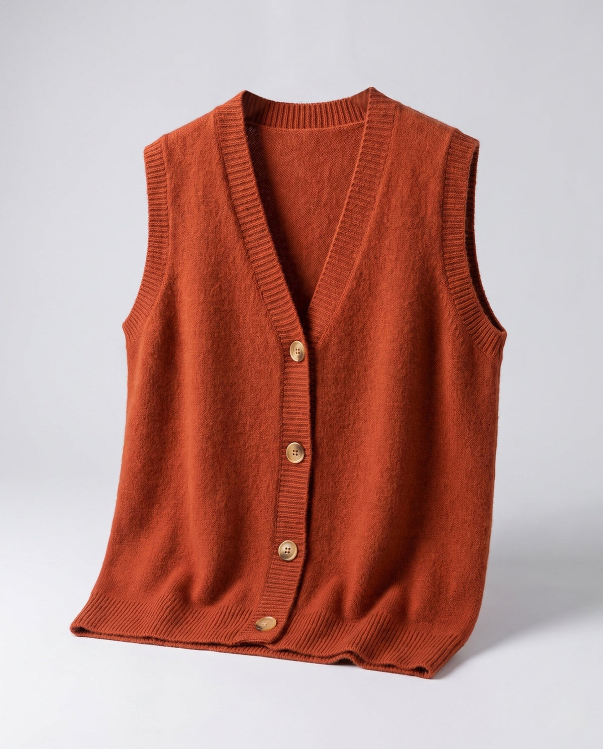 Gilet femme sans manches en maille de laine mélangée avec col en V et patte de boutonnage