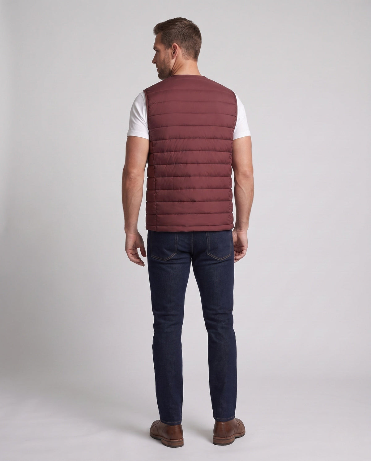 Gilet matelassé sans manches pour homme à aspect duvet léger et fermeture à boutons-pression