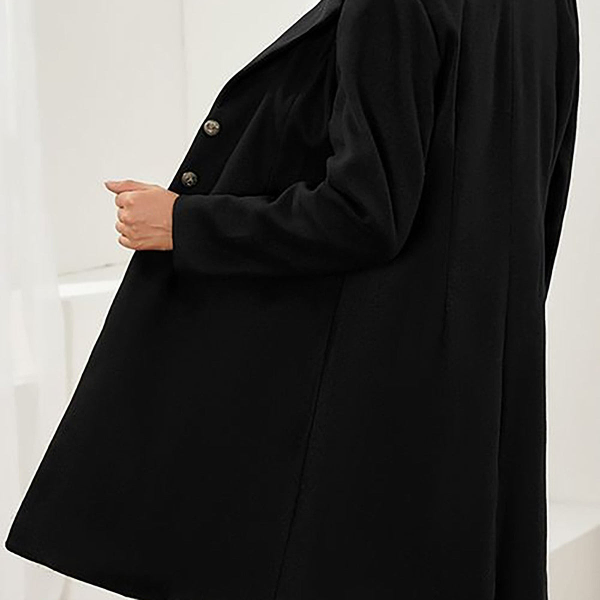 Manteau femme noir chaud à la coupe cintrée