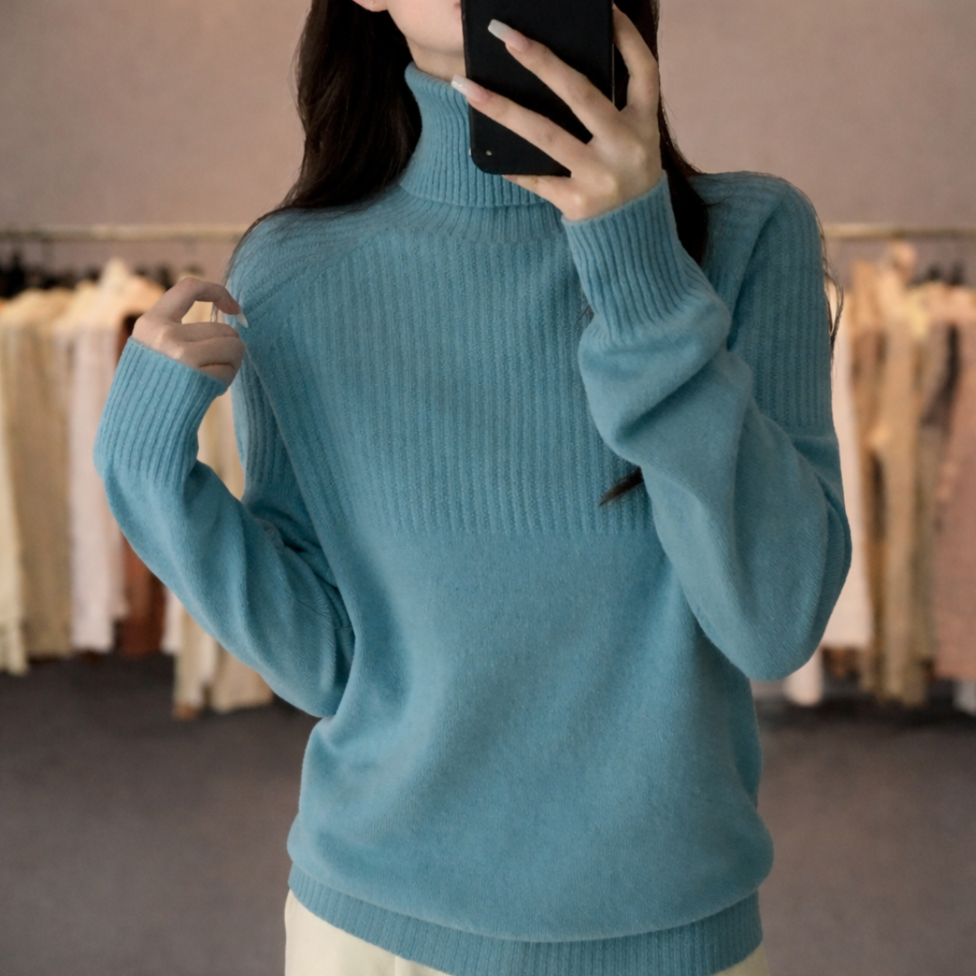 Pull à col roulé et manches côtelées pour femme
