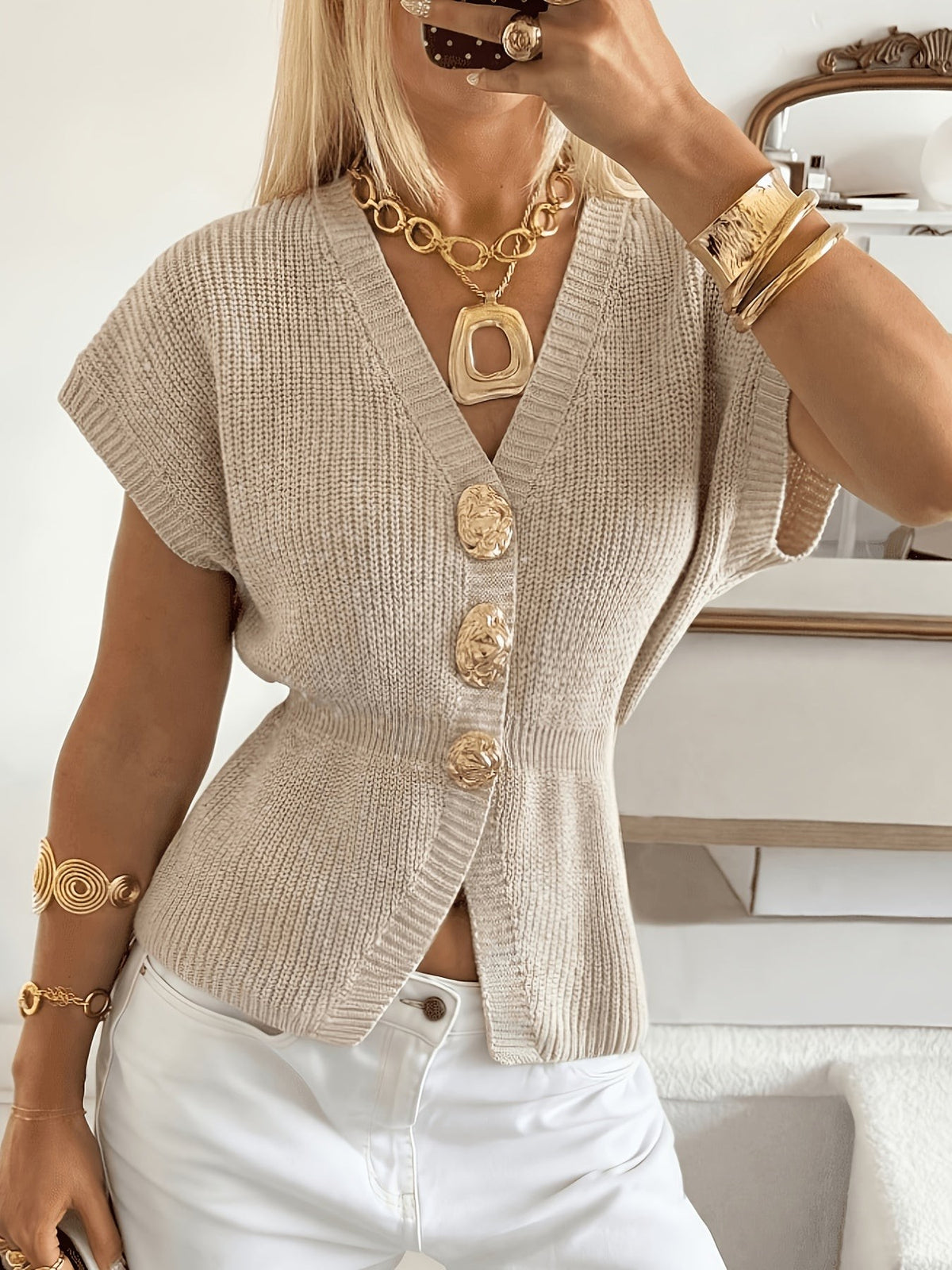 Pull sans manches boutonné devant